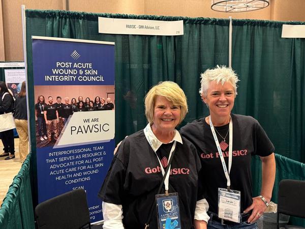 PAWSIC members at AAPACN booth